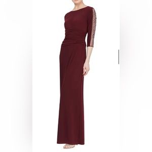 NWT burgundy dress, ruched stomach, beaded sleeve, stretchy material,flattering